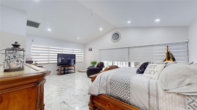 bedroom featuring lofted ceiling