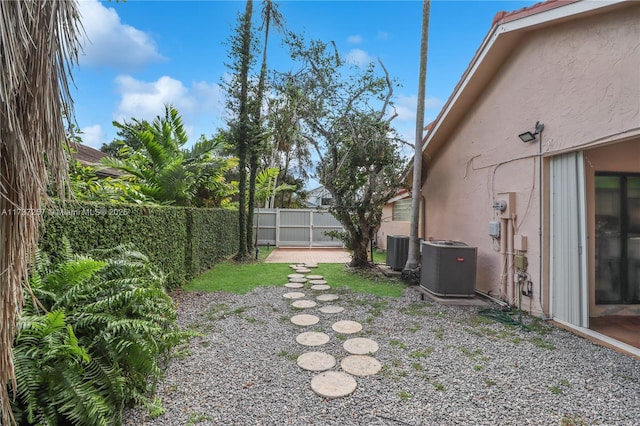 view of yard featuring central AC