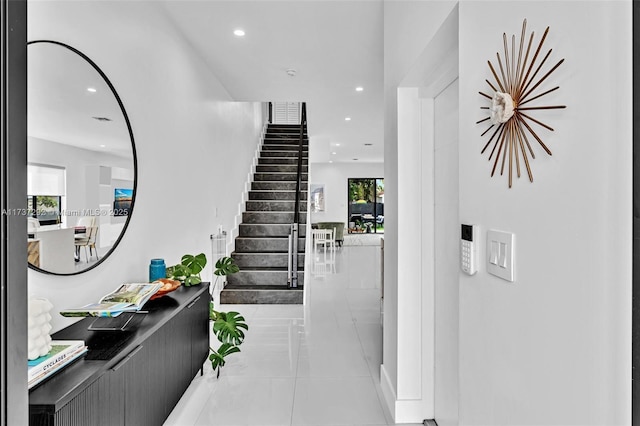 interior space with tile patterned floors