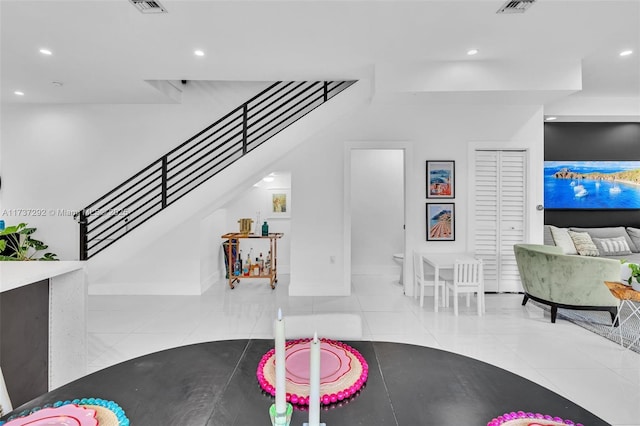 interior space featuring light tile patterned floors