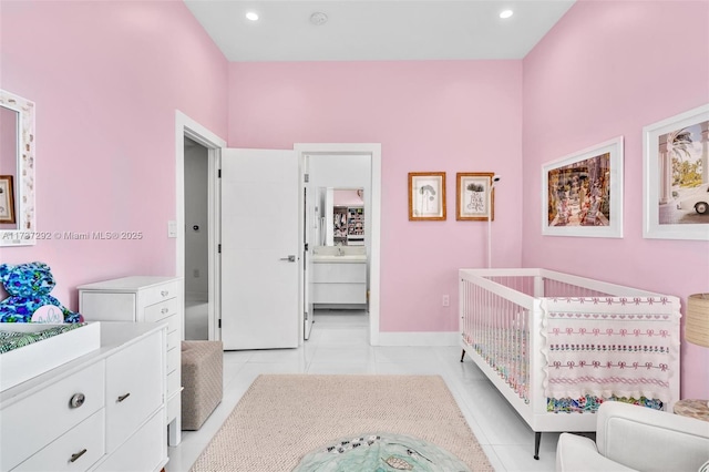 bedroom with light tile patterned floors