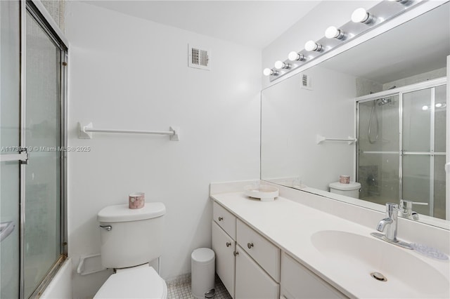 full bathroom with vanity, shower / bath combination with glass door, and toilet