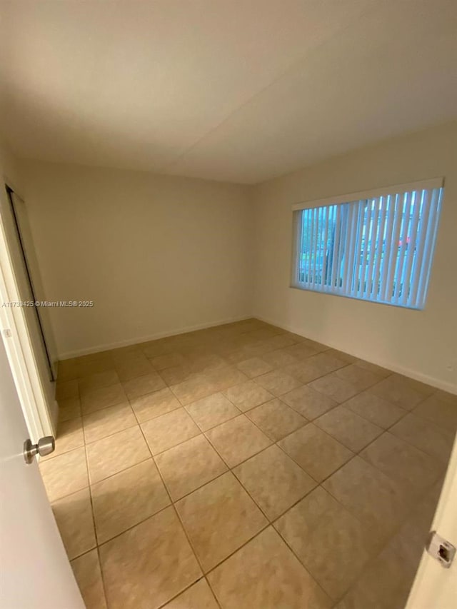 10194 Twin Lakes Dr Unit 14-A, Coral Springs, FL 33071 - unfurnished room with light tile patterned flooring