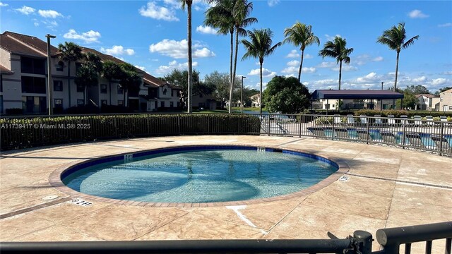 view of pool featuring a patio area