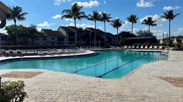 view of swimming pool featuring a patio