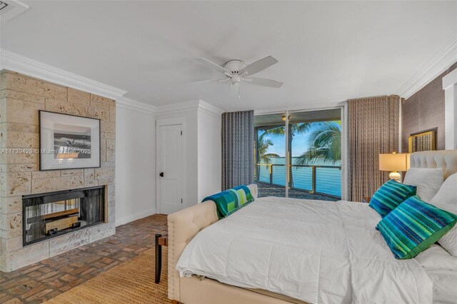 bedroom featuring crown molding, access to outside, a multi sided fireplace, and ceiling fan