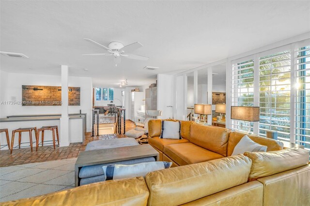 living room featuring ceiling fan