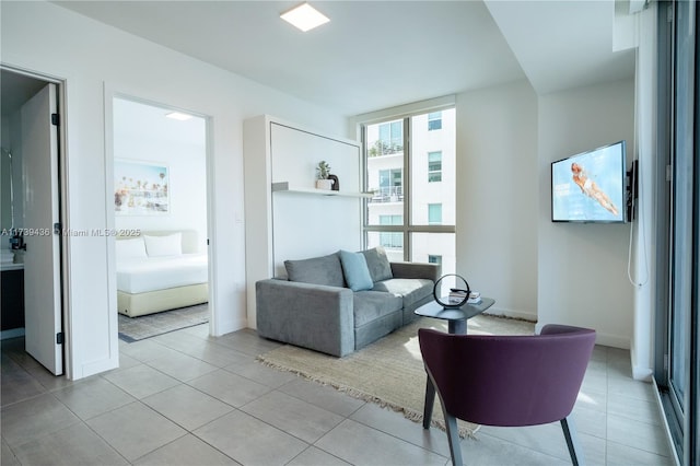 living room with light tile patterned floors