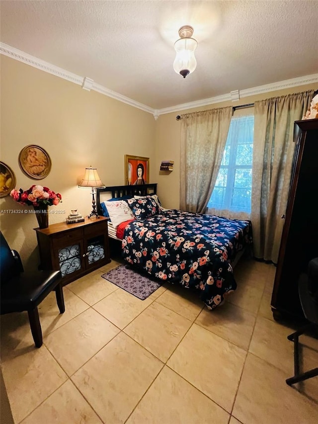 tiled bedroom featuring crown molding and a textured ceiling