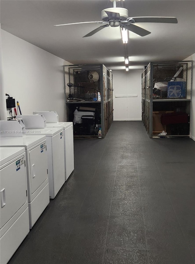 washroom with laundry area, separate washer and dryer, and a ceiling fan