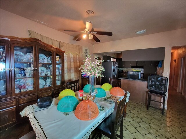 dining area featuring ceiling fan