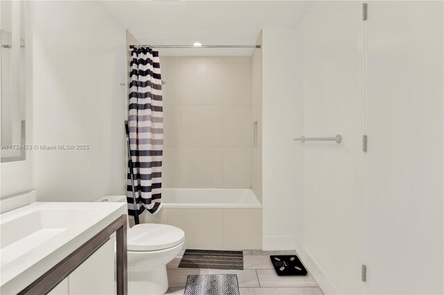 full bathroom with vanity, shower / bathtub combination with curtain, and toilet