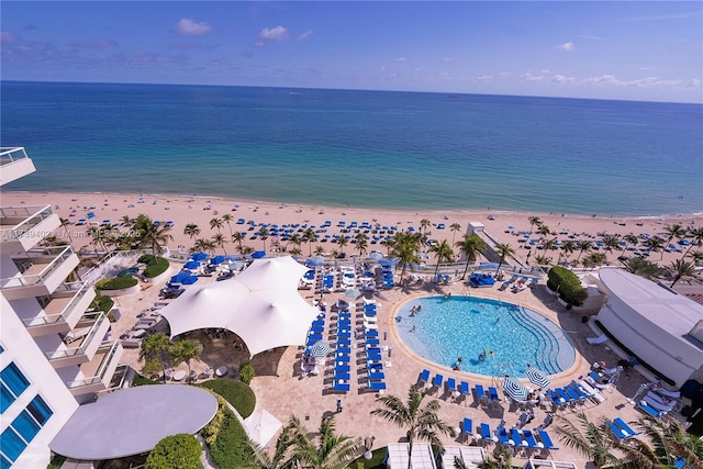 bird's eye view with a view of the beach and a water view