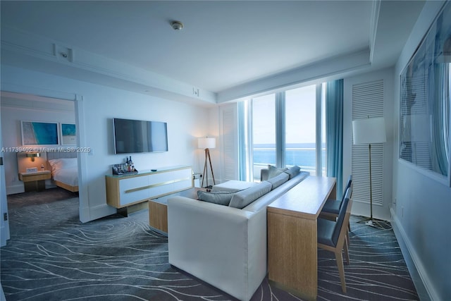 living room featuring a water view