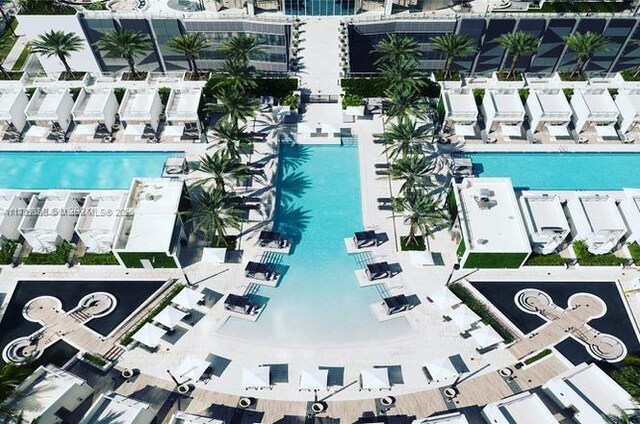 view of swimming pool with a patio area