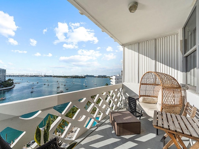 balcony featuring a water view