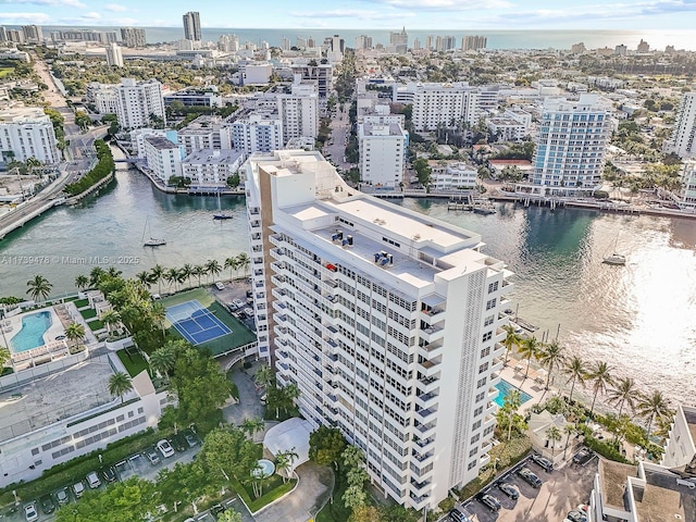 birds eye view of property featuring a water view