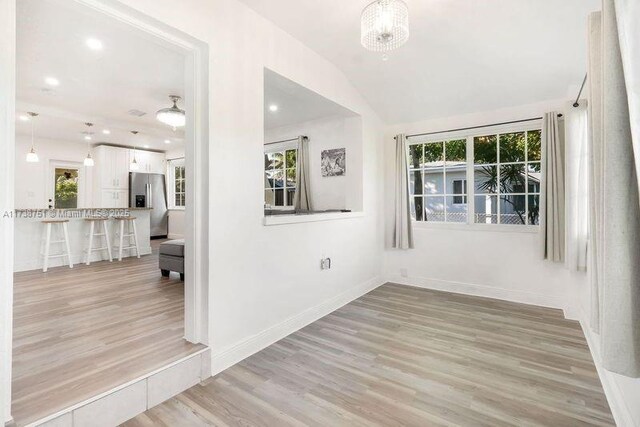 hallway featuring light hardwood / wood-style flooring