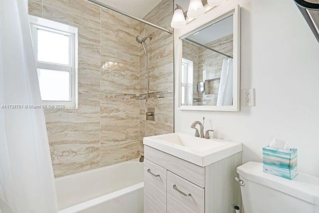 full bathroom featuring vanity, toilet, and shower / bath combo with shower curtain