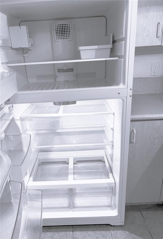 interior details featuring fridge
