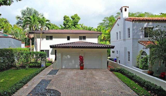 view of front of property with a garage