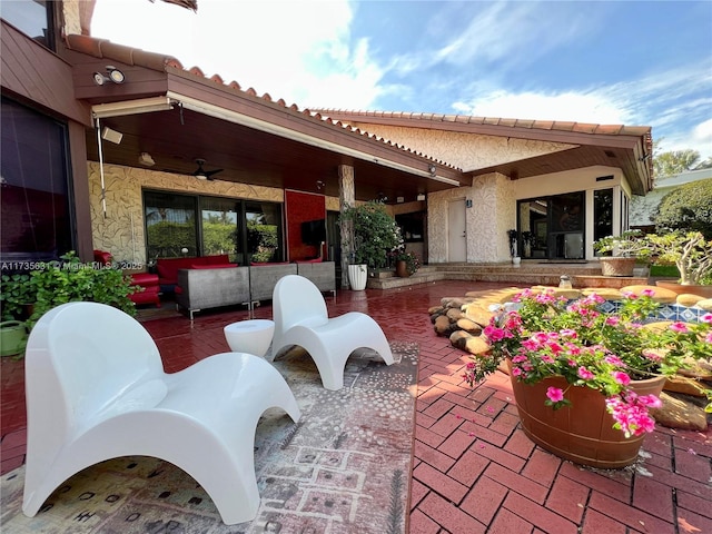 view of patio / terrace with ceiling fan