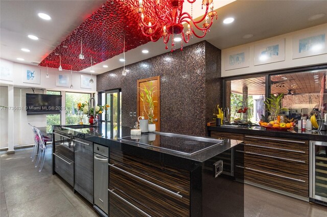 interior space with sink and a notable chandelier