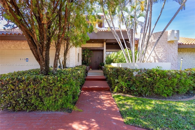 view of front of home with a garage