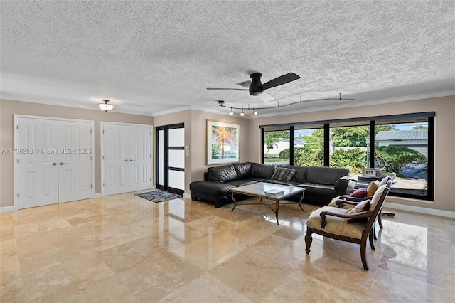 living room with crown molding and a textured ceiling