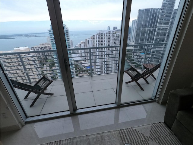 balcony featuring a water view