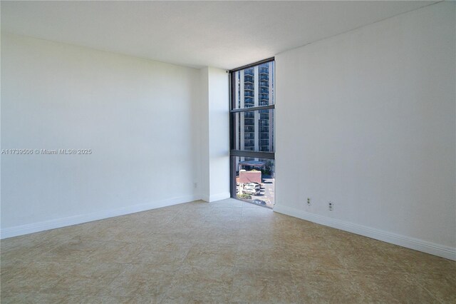 empty room with expansive windows