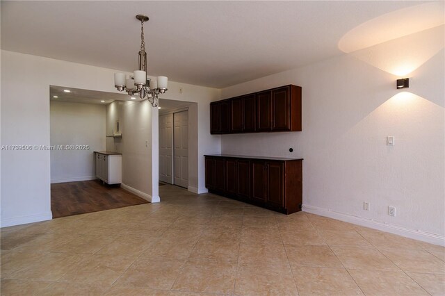 interior space featuring a chandelier