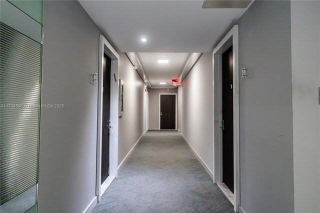 hallway with light carpet