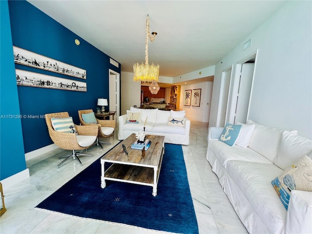 living room with an inviting chandelier