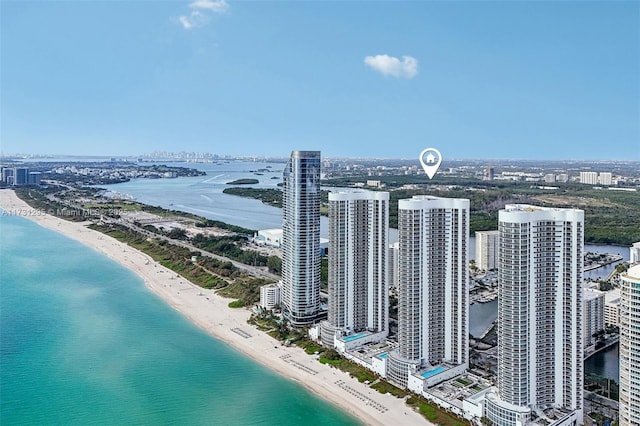 aerial view with a view of city, a water view, and a view of the beach