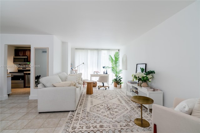 living room with light tile patterned floors