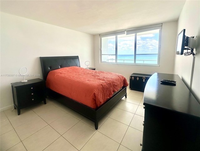 bedroom featuring light tile patterned floors