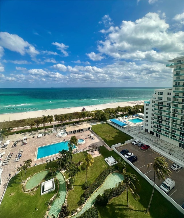 5005 Collins Ave Unit 1212, Miami Beach, FL 33140 - drone / aerial view of a pool area and expansive coastline