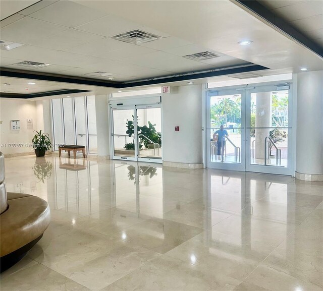 5005 Collins Ave Unit 1212, Miami Beach, FL 33140 - building lobby featuring a paneled ceiling