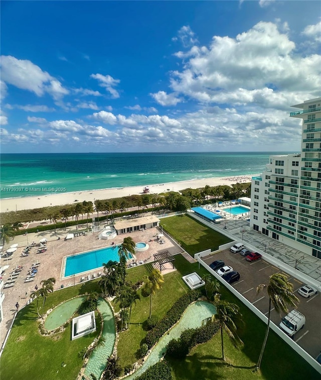 aerial view with a view of the beach and a water view