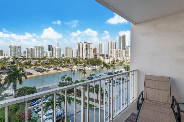 balcony featuring a water view