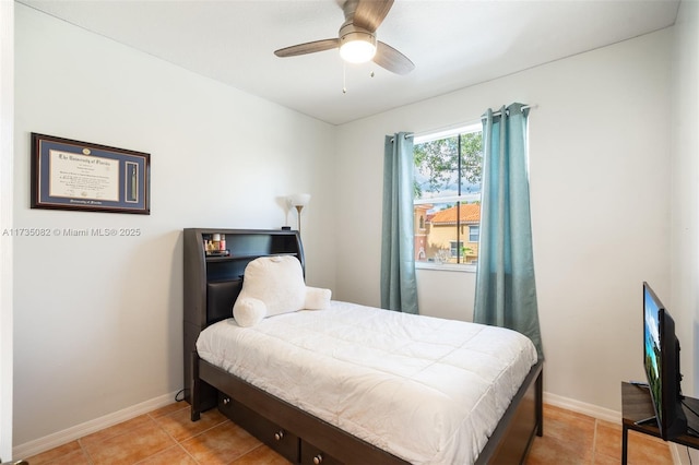 bedroom featuring light tile patterned floors and ceiling fan