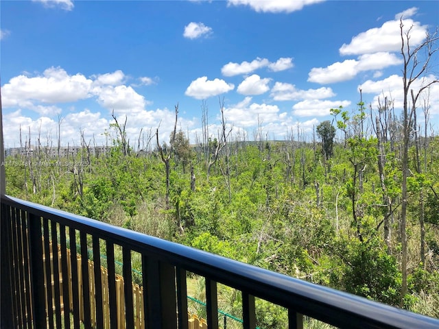 balcony with a wooded view