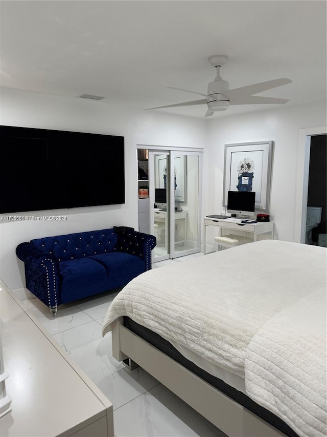 bedroom featuring ceiling fan