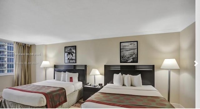 bedroom featuring ornamental molding