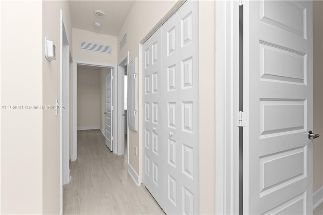 hallway featuring light hardwood / wood-style floors