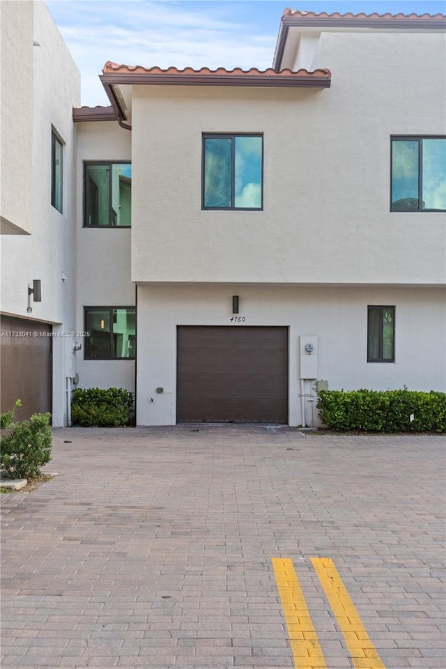 view of front of home with a garage