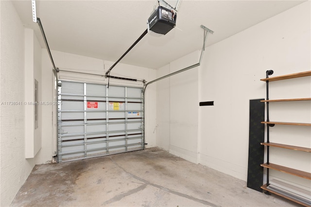 garage featuring a garage door opener