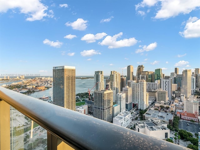 property's view of city with a water view