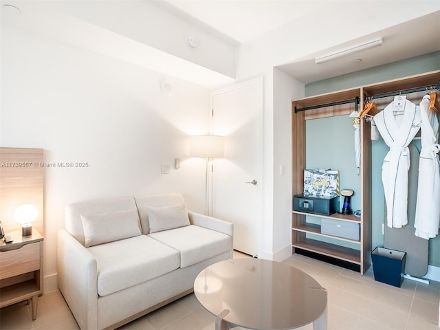 living room featuring light tile patterned flooring